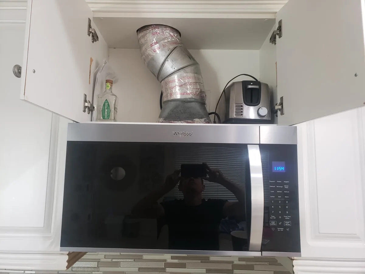 Cabinet ducting for an over-the-range microwave installation by All Year Heating & Air